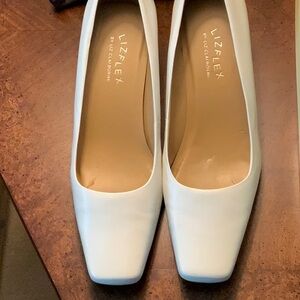 Vogue White Kidskin Pumps